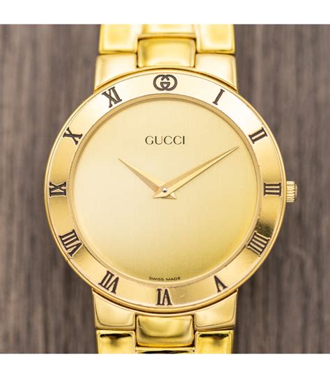 1993 gucci watch gold band black plate|Gucci Watch Gold Black .